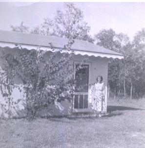 Dorothy Lorson McKelvey at door of the wash house!