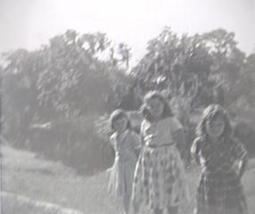 Marsha, Linda, and Carolyn in the backyard 